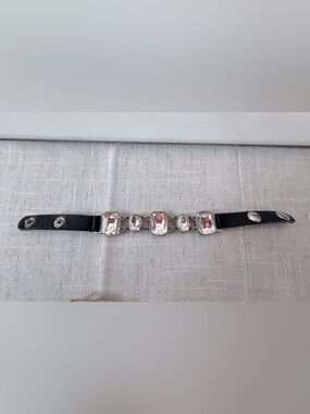 black Guang Tong bracelet features clear rhinestone stones in various shape